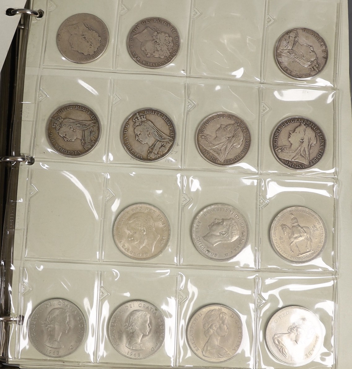 An album of British crowns, halfcrowns, florins and decimal 50 pence and 20 pence coins, including 1819 crown F, etc. and various loose UK coins and banknotes in envelopes